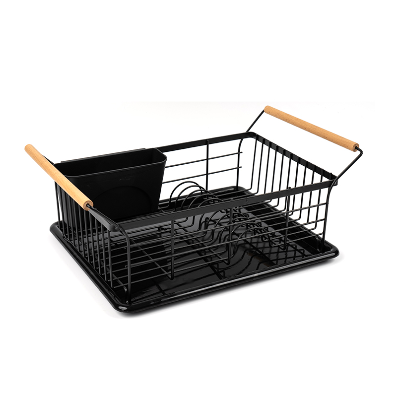 En torkställning för skål och tallrik med trähandtag